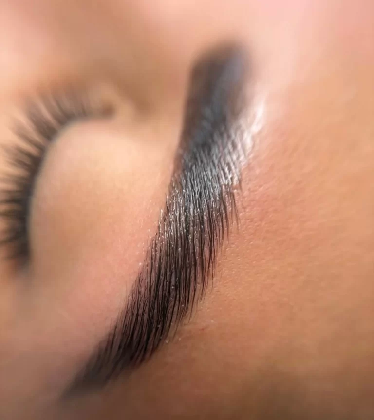 Is eyebrow feathering the same as microblading?